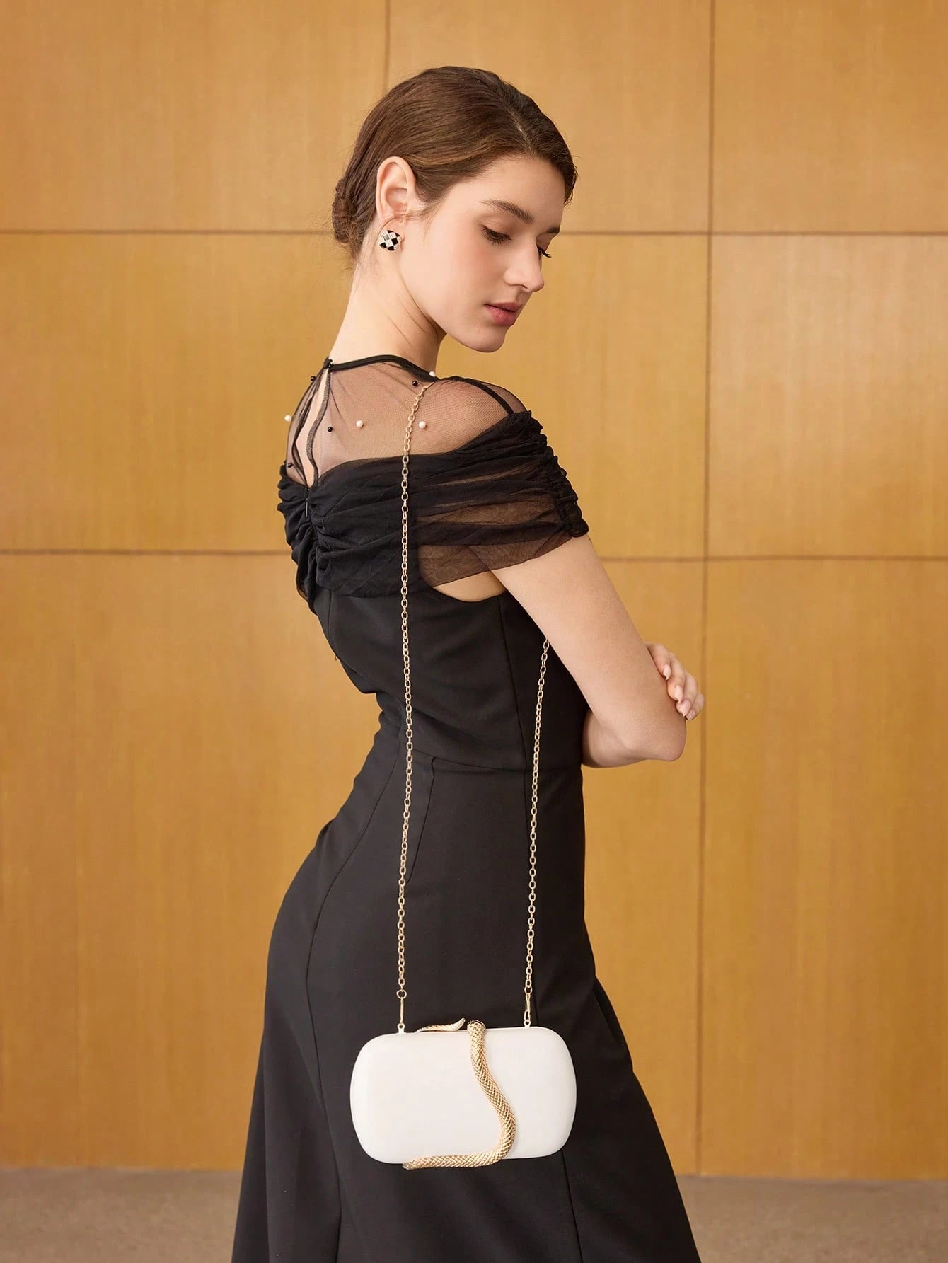 Serpent Curve Statement Clutch