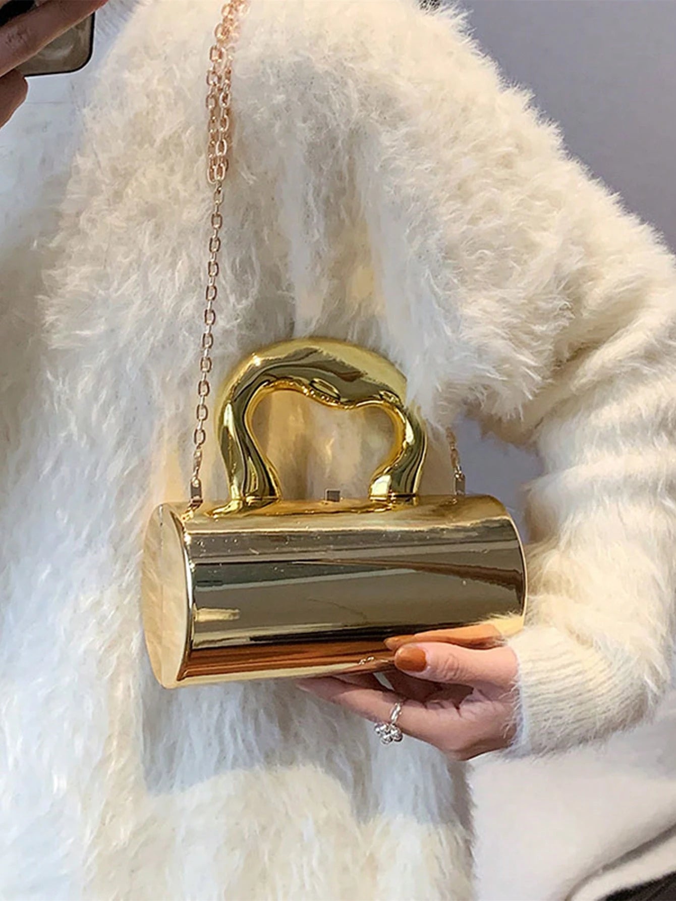 Auric Curve Mini Clutch – Sculptural Gold Statement Bag