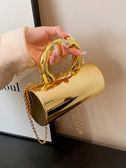 Auric Curve Mini Clutch – Sculptural Gold Statement Bag