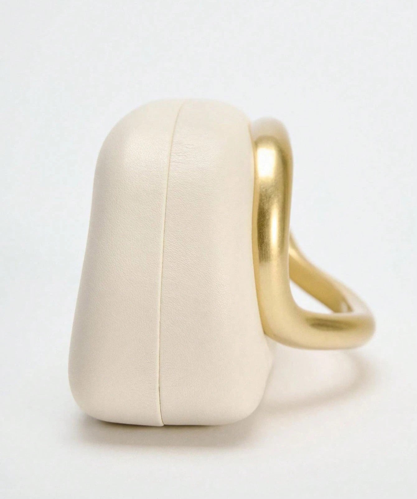 C-Handle Sculptural Cream Clutch