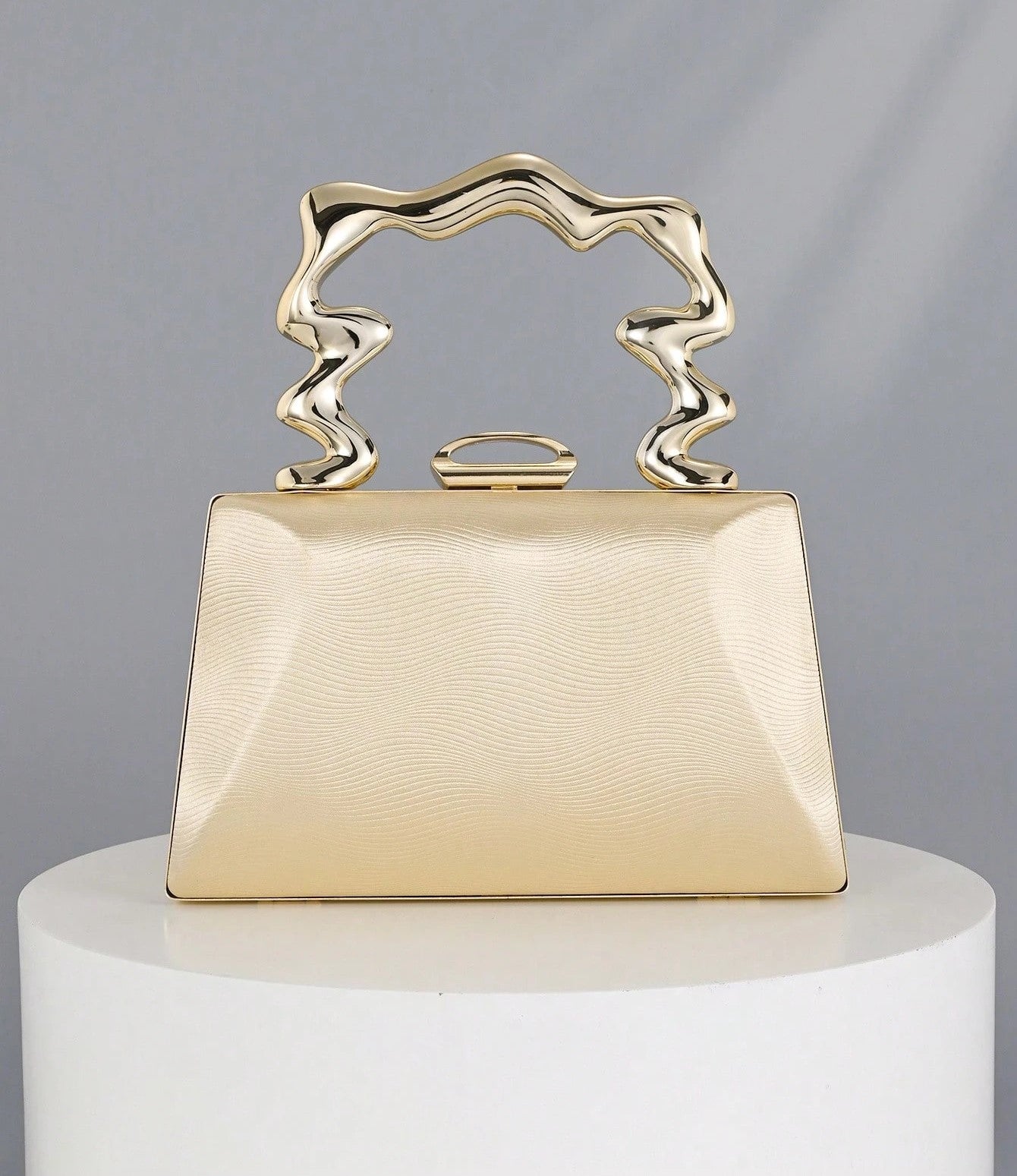 Sculpted Wave Handle Evening Bag