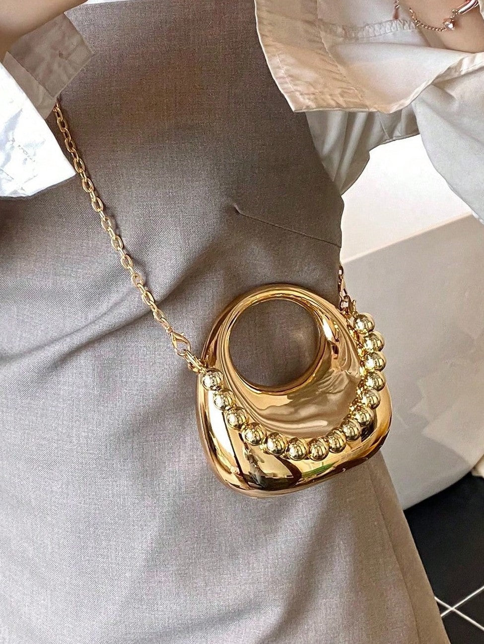 Gold Sculpted Mini Statement Bag