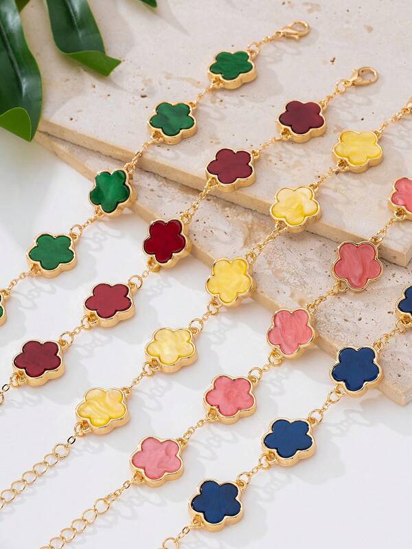 Clover Luxe™ – Gold-Tone Charm Bracelet