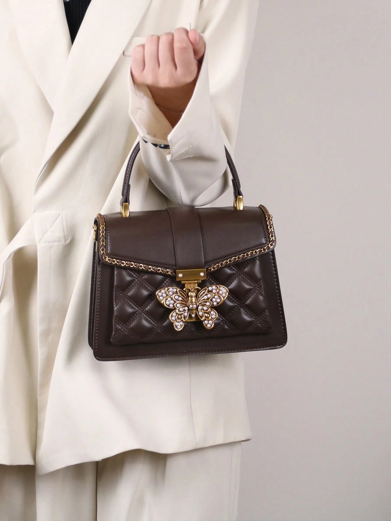 Butterfly Lock Quilted Top-Handle Bag