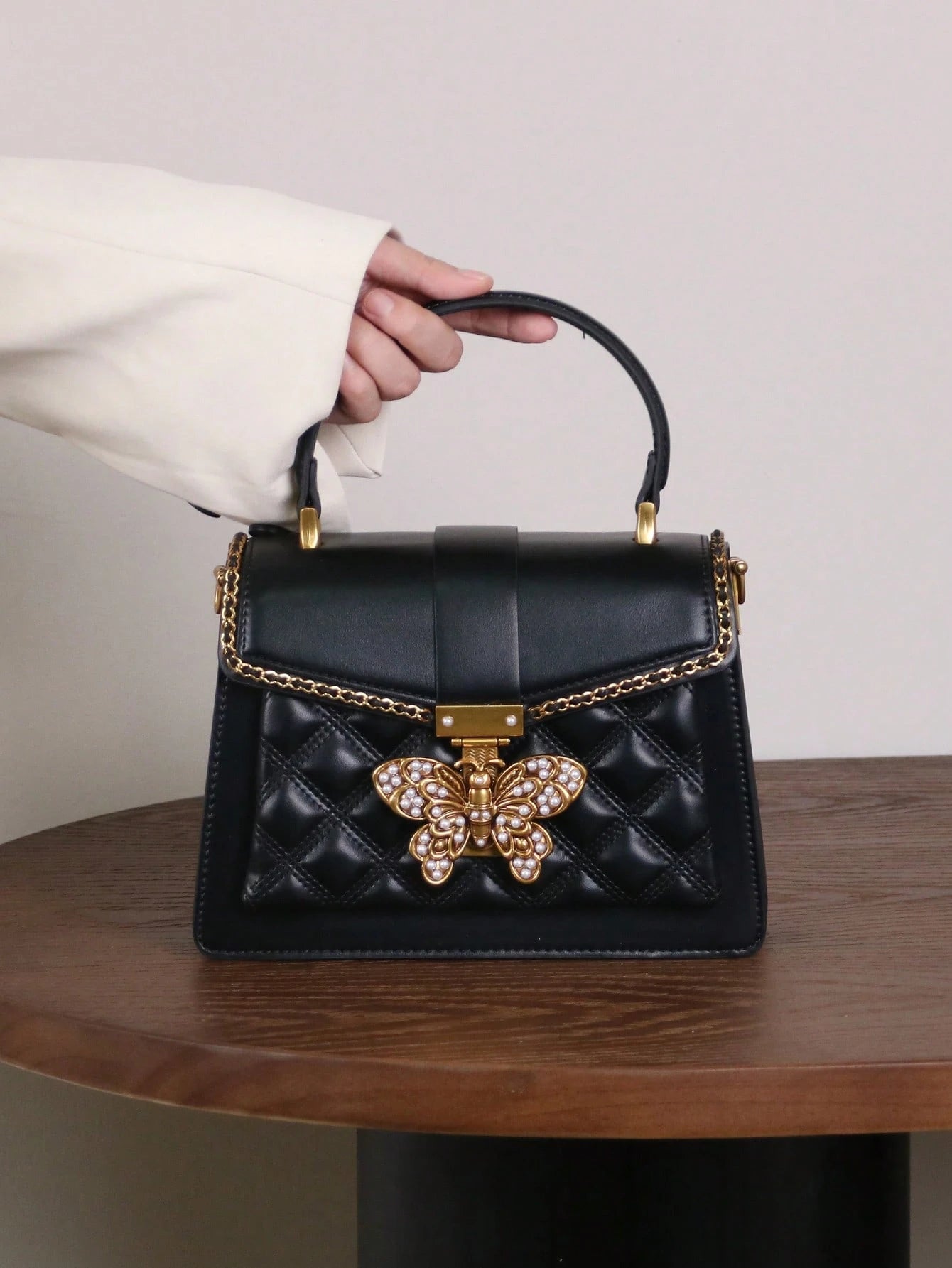 Butterfly Lock Quilted Top-Handle Bag