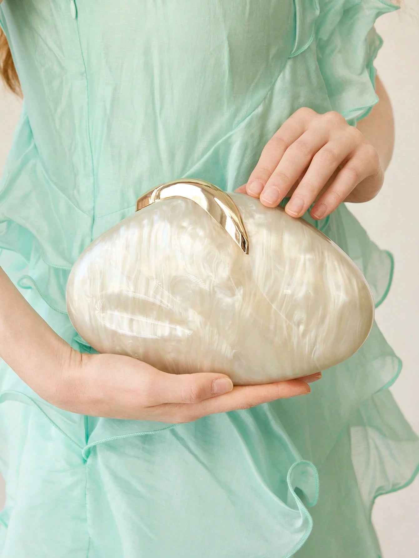 Pearl Shell Statement Clutch