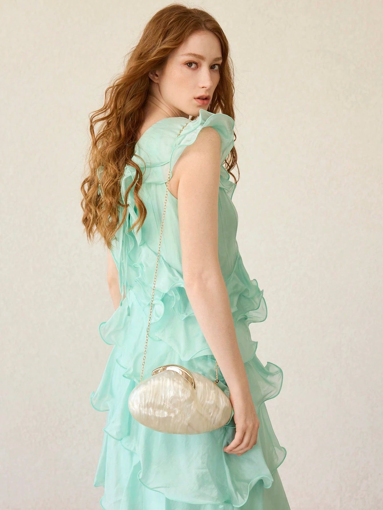 Pearl Shell Statement Clutch
