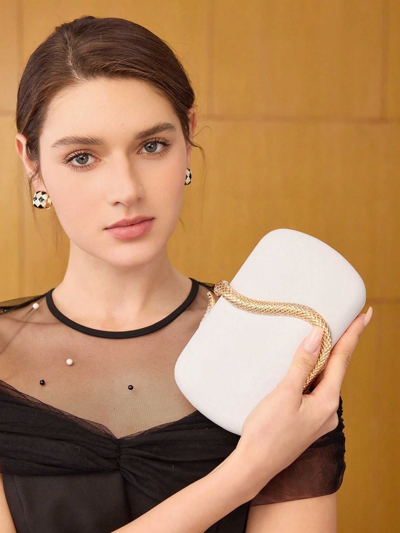 Serpent Curve Statement Clutch